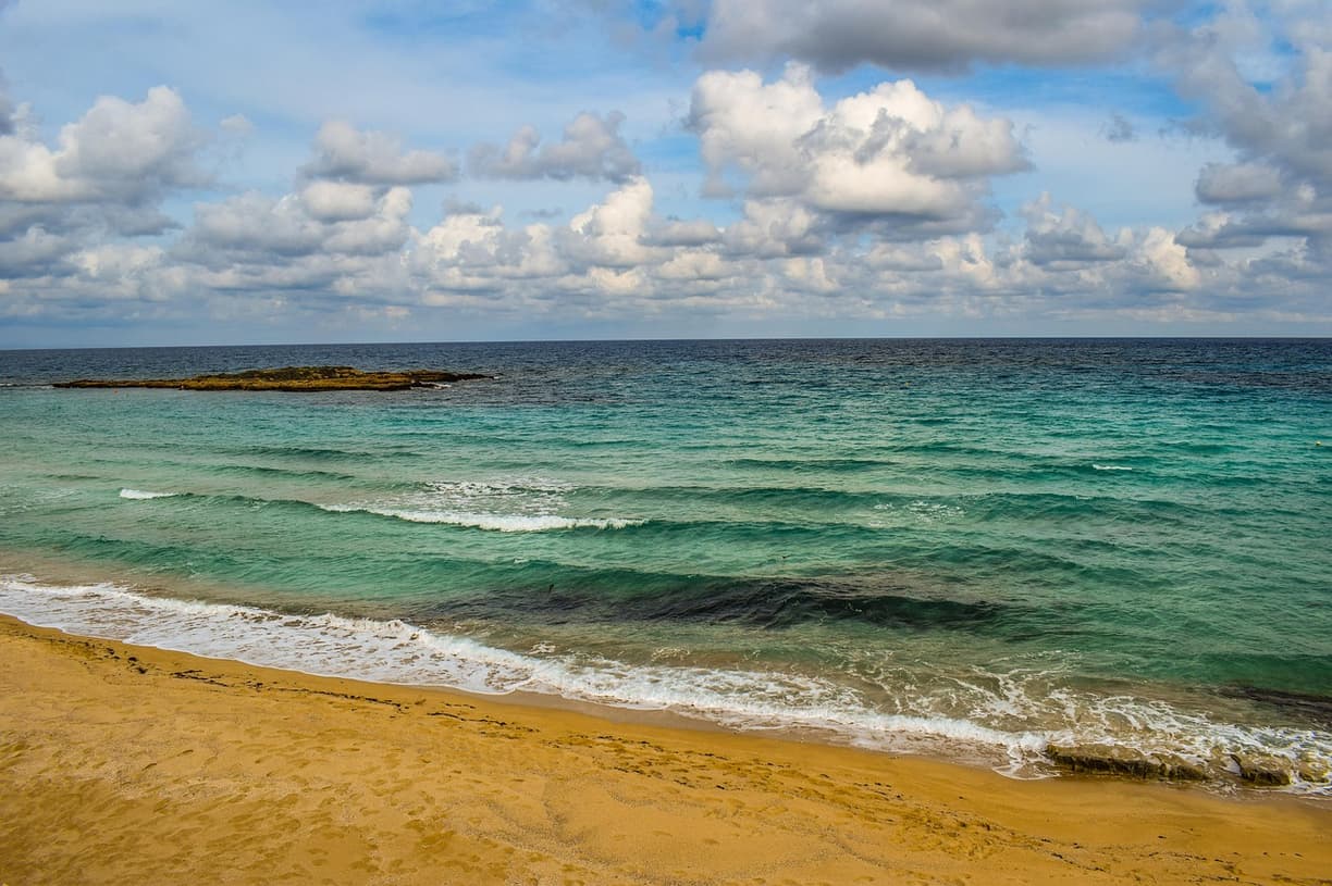 Widok na Fig Tree Bay podczas zachodu słońca